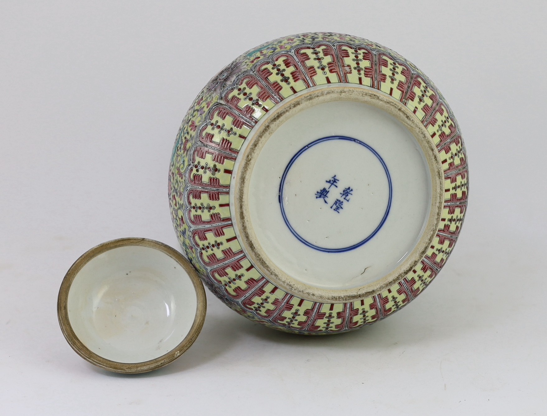 A large and rare Chinese famille rose fencai wine pot and cover, Qianlong mark but 19th century, 35.5cm high